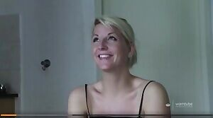 Veronica smiling after being hit with pie