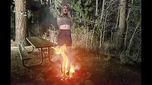 Burning at the stake fetish - A cute girl burning in a campfire