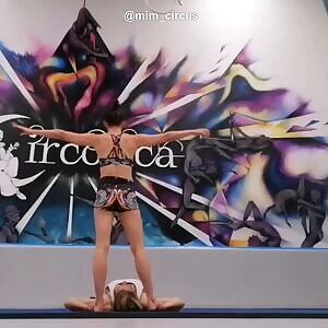 Circus trick requiring massive arm strength