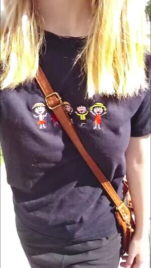 Almost caught flashing her boobs in public