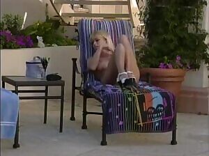 Jenna Jameson masturbating by the poolside