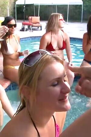 She Lets Him Cum On Her By The Pool