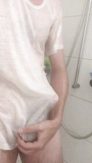 wet white shirts are a great look for men too!