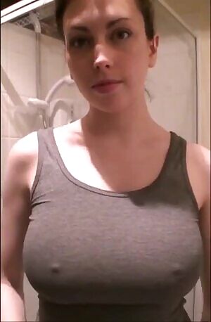 Revealing her awesome tits