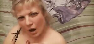 Sexy milf launches a load onto her face