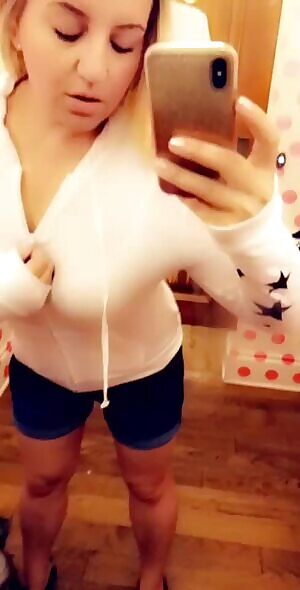 Pulling them out while trying on the hoodie. ❤️