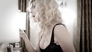 Avril Lavigne showing off cleavage in a music video