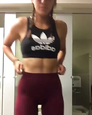 Jiggling her ass in red yoga pants