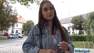 Revealing her tits for money in the street