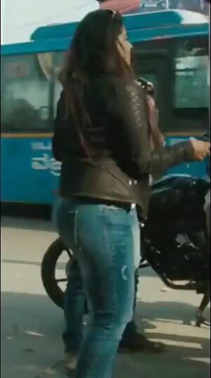 This chick's hiding some thicc derriere under those jeans...