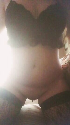 Bra is coming of in lace thigh highs