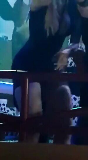 No Panties In The Club Holding A Cigarette