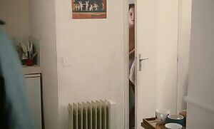 Marion Cotillard doing a poor job of covering her boobs