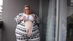 Juicy Jackie pulls out that huge belly of hers and plays with it
