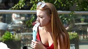 Gorgeous redhead giving them some air