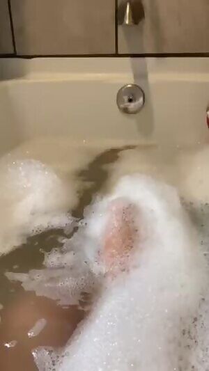My gfs beautiful feet in the bath