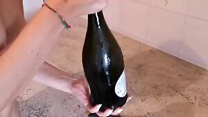 Draining champagne bottle with a blowjob