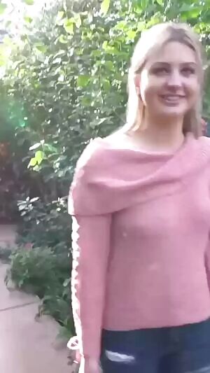 Flashing her boobs in the butterfly garden