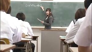 Japanese teen rubbing and squirting at her desk in class