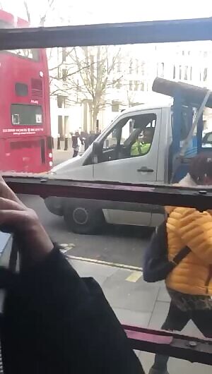 Three bimbos show off their big fake tits to builders in London