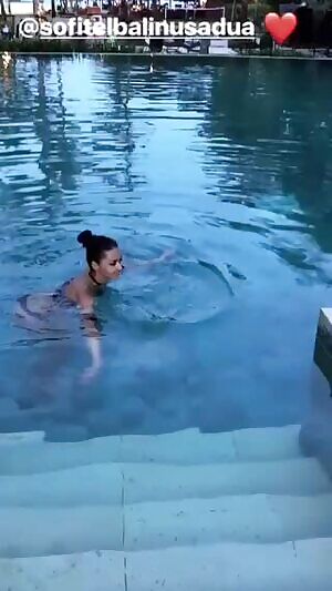 Squeezing her tits for us all