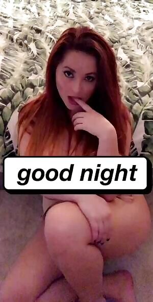 Lucy sucking on her finger.