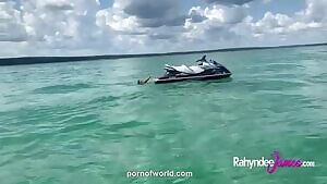 Naked Rahyndee James on the high seas on a jet ski