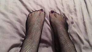 wiggling my purple toes in fishnets
