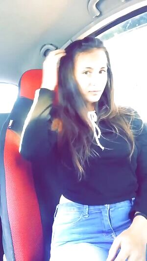 Checking her hair before a small drop