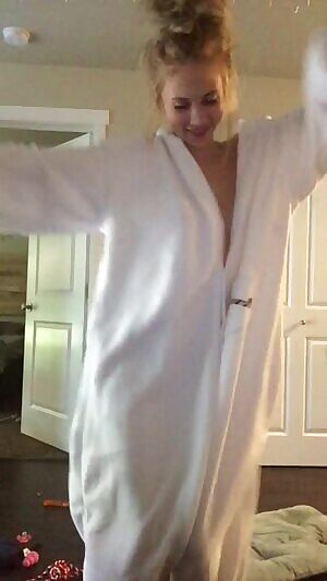 Blonde in onesie showing off