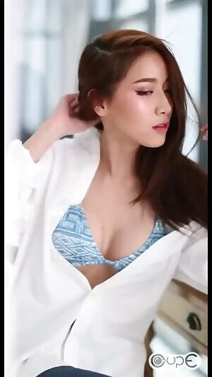 Adjusting Her Bra