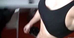 Spinning around her bedroom