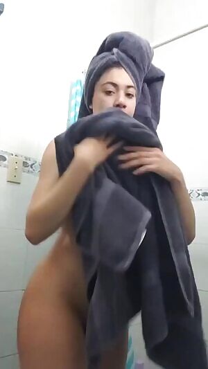 Giselle Montes casually drying herself