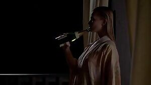 Jaime Pressly playing with champagne in 