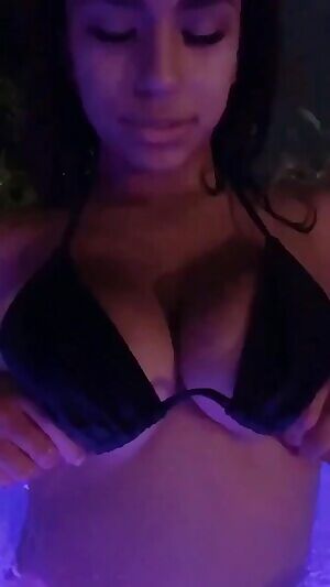 Grabbing her tits