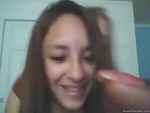 Happily embarassed by her friend