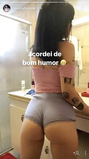 Girl with tattoo's showing a bit of her ass in the bathroom