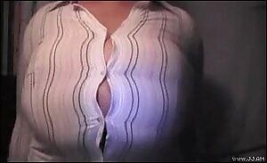 Exploding button by large breasts
