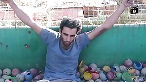 ISIS toddler executes a man in a ball-pit.