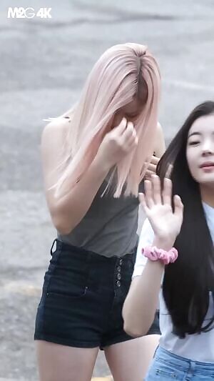 ryujin - adjusting her shirt