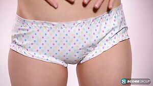 Dolly Little removes her panties