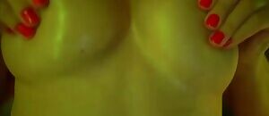 webcam girl plays w/ her boobs