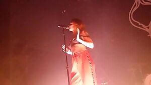 Tove Lo pulling her tits out during a concert