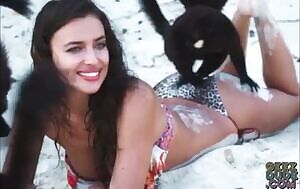 Irina Shayk has a lemur play on her bikini butt - looped