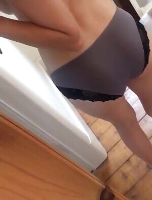 Showing her body in the mirror