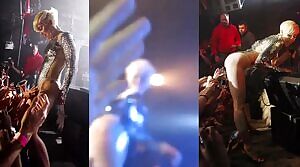 Miley Cyrus getting her pussy, tits and ass rubbed by the audience while performing on stage