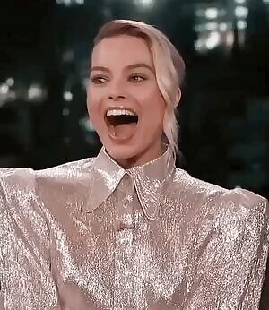 Margot Robbie being shown posts about her from here on live television...
