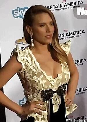 Scarlett Johansson pumping her chest out