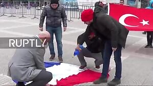 Cockroaches burning the wrong flag