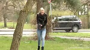 Nathaly pissing near the street